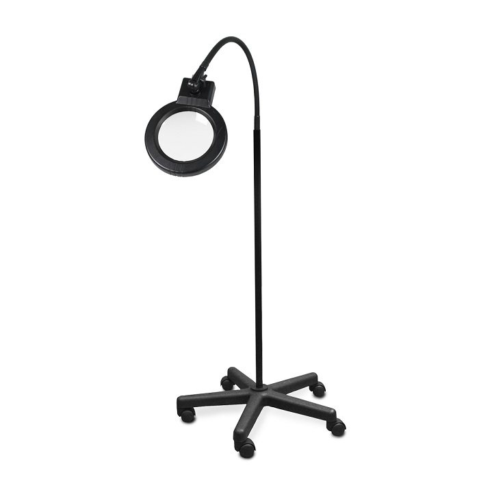 Floor standing magnifier with outlet light